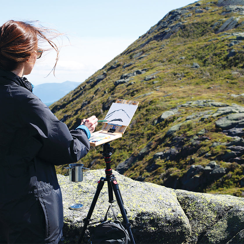 u.go Plein Air Anywhere Pochade Box, 6" x 8" model, on tripod while plein air landscape painting