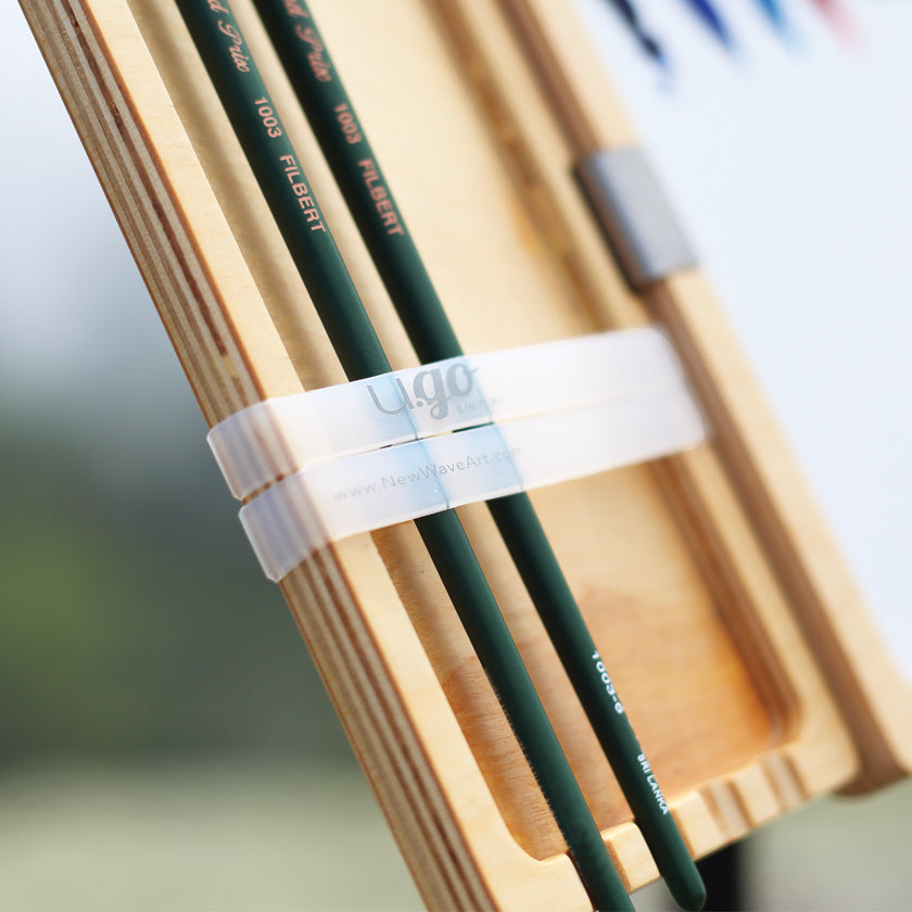 u.go Plein Air Cinch holding brushes in place on a u.go Anywhere Side Tray